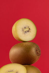 Close-up of granny smith apple on yellow background