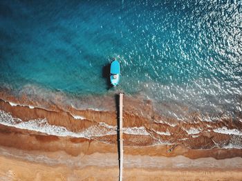 Aerial view of boat moored on sea