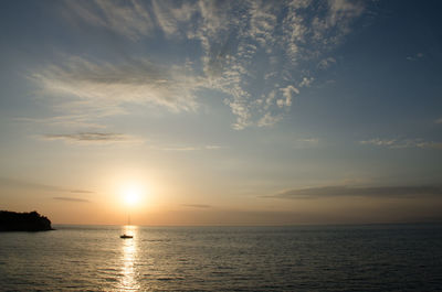 Scenic view of sea at sunset