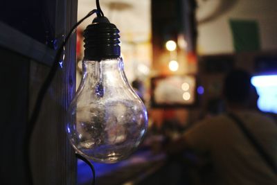 Close-up of illuminated light bulb