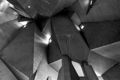 Black and white, abstract geometric shape and form of concrete ceiling of brutalist architecture.