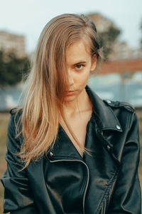 Portrait of young woman looking away