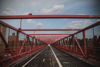 Bridge over road against sky