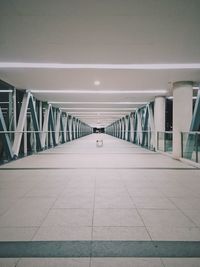 Man in corridor of building