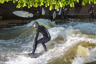 Rear view of man on shore