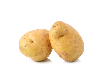 Close-up of fruits against white background