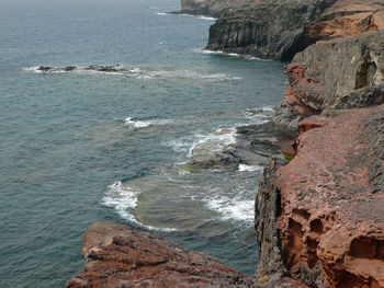 Scenic view of sea from cliff coast