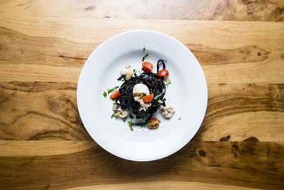 High angle view of fruits in bowl on table