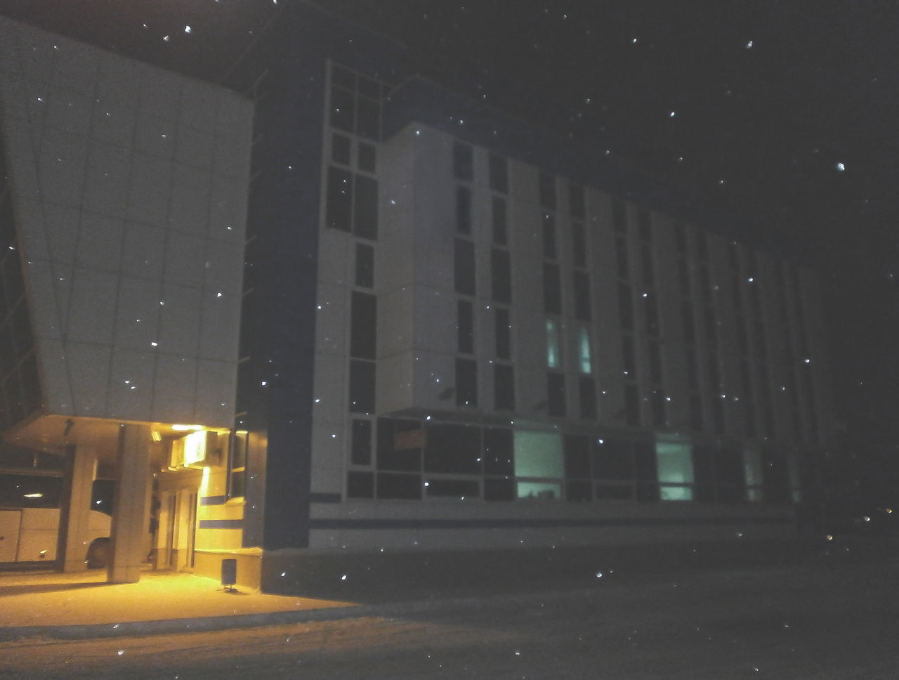 VIEW OF BUILDING AT NIGHT