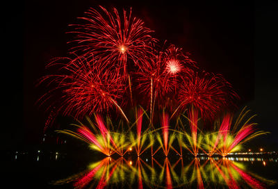 Firework display at night