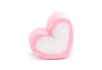 Close-up of heart shape over white background