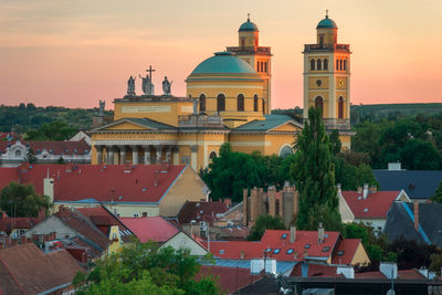 High angle view of bell tower in city against sky