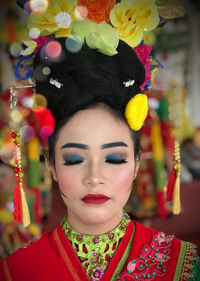 Close-up of young woman with make-up