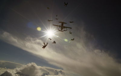 Low angle view of sun in sky