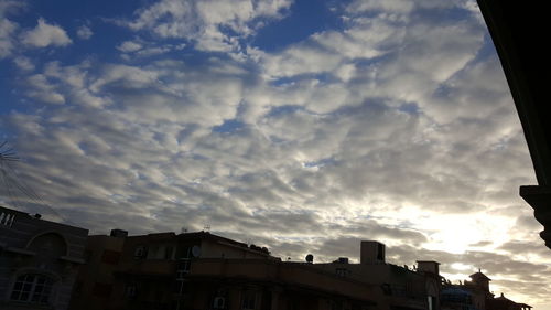 Low angle view of houses against sky