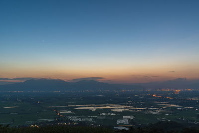 High angle view of townscape against sky during sunset