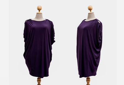 Clothes hanging on white background