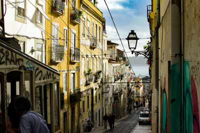 Panoramic view of city street against sky