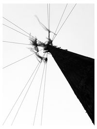 Low angle view of windmill