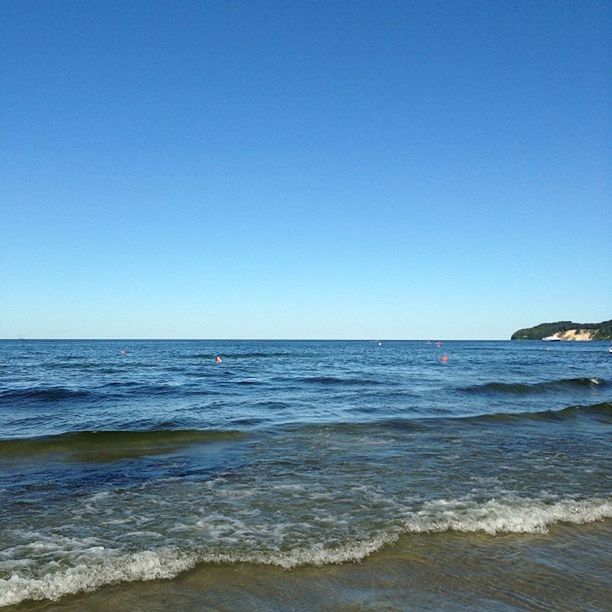 sea, horizon over water, water, clear sky, beach, copy space, scenics, tranquil scene, shore, wave, tranquility, beauty in nature, blue, nature, sand, surf, idyllic, seascape, coastline, remote