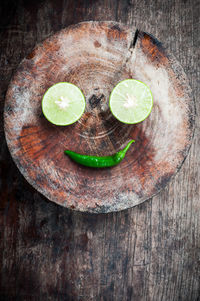 High angle view of lemon slices and chili