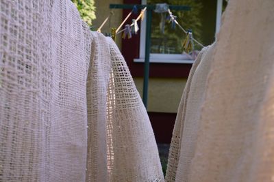 Close-up of clothes hanging on clothesline