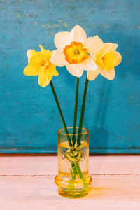 Close-up of yellow flower in vase on table