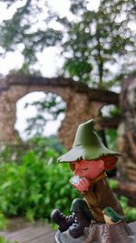 Close-up of red toy on tree