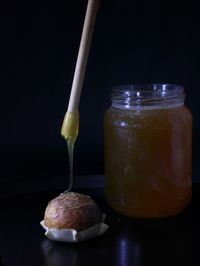 Close-up of cocktail in glass jar on table