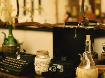 Close-up of wine bottles on table