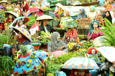 Statues in market stall for sale