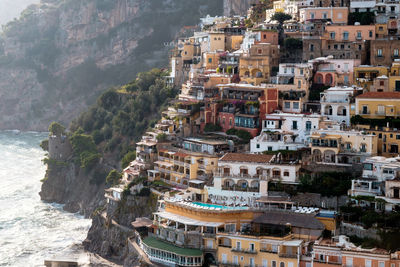 High angle view of townscape by sea