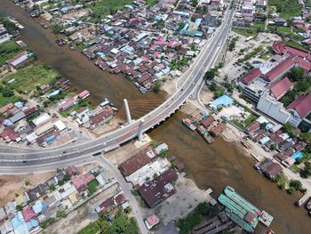 High angle view of street amidst buildings in city