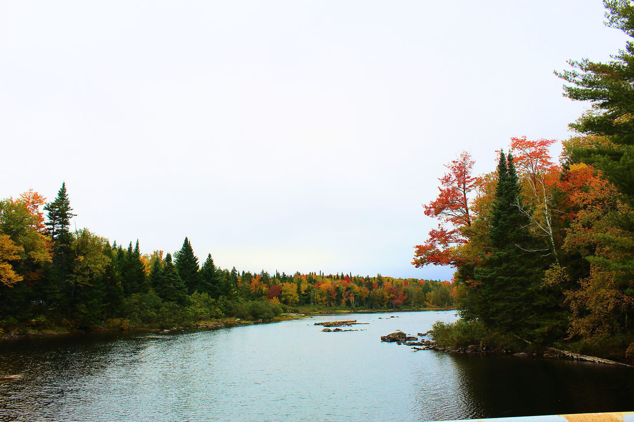 SCENIC VIEW OF LAKE AGAINST SKY DURING AUTUMN