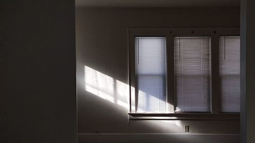 Sunlight streaming through window of building