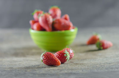 Close-up of strawberries in bowl on table