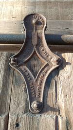 Low angle view of sculpture on wall