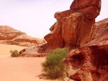 Scenic view of rock formations against sky