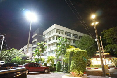 View of illuminated street at night