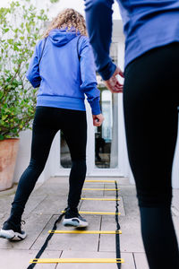 Women walking on footpath