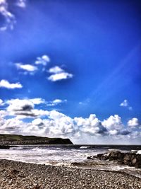 Scenic view of beach against sky