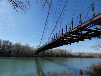 Low angle view of bridge over river