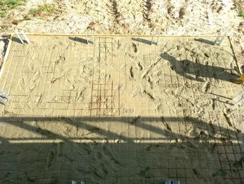 High angle view of shadow on sand