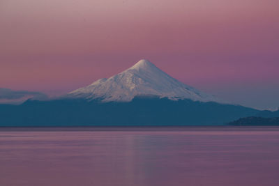 Long exposure sunset over the volcano at the lake in puerto varas in chile