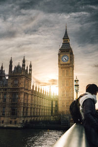 Rear view of woman standing in city big ben 