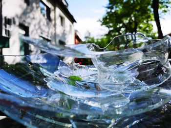 Close-up of water splashing in glass