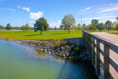 Scenic view of canal against sky