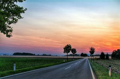 Road passing through field