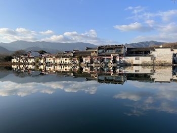 Buildings in city against sky