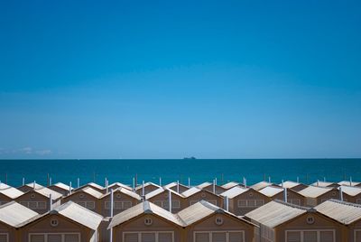 View of beach against blue sky